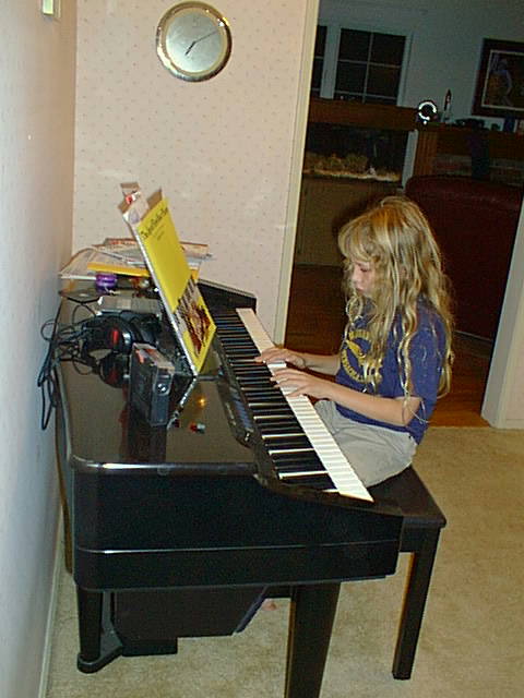 Anna playing piano