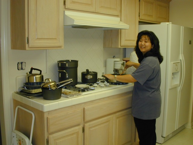 Cheryl making our first home-cooked meal