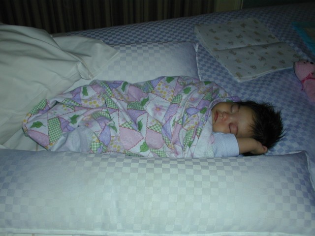 Asleep on hotel bed