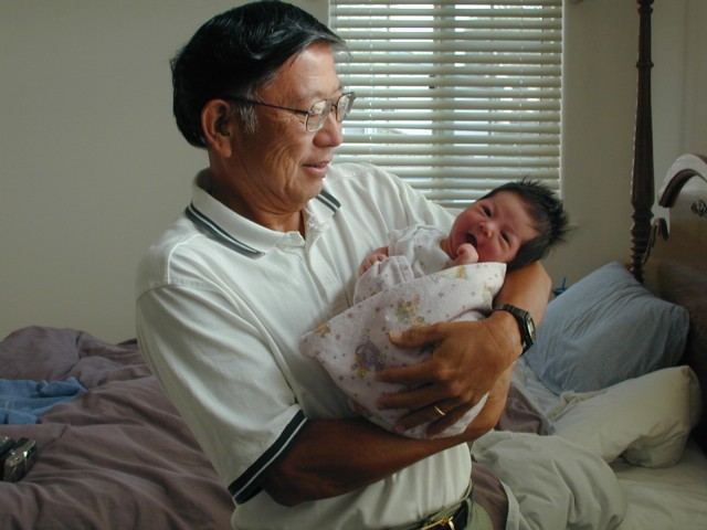 Grandpa holding Lura