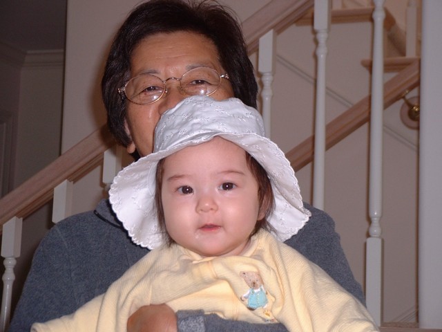 With Grandma and hat