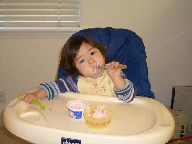 Two-fisted yogurt eater